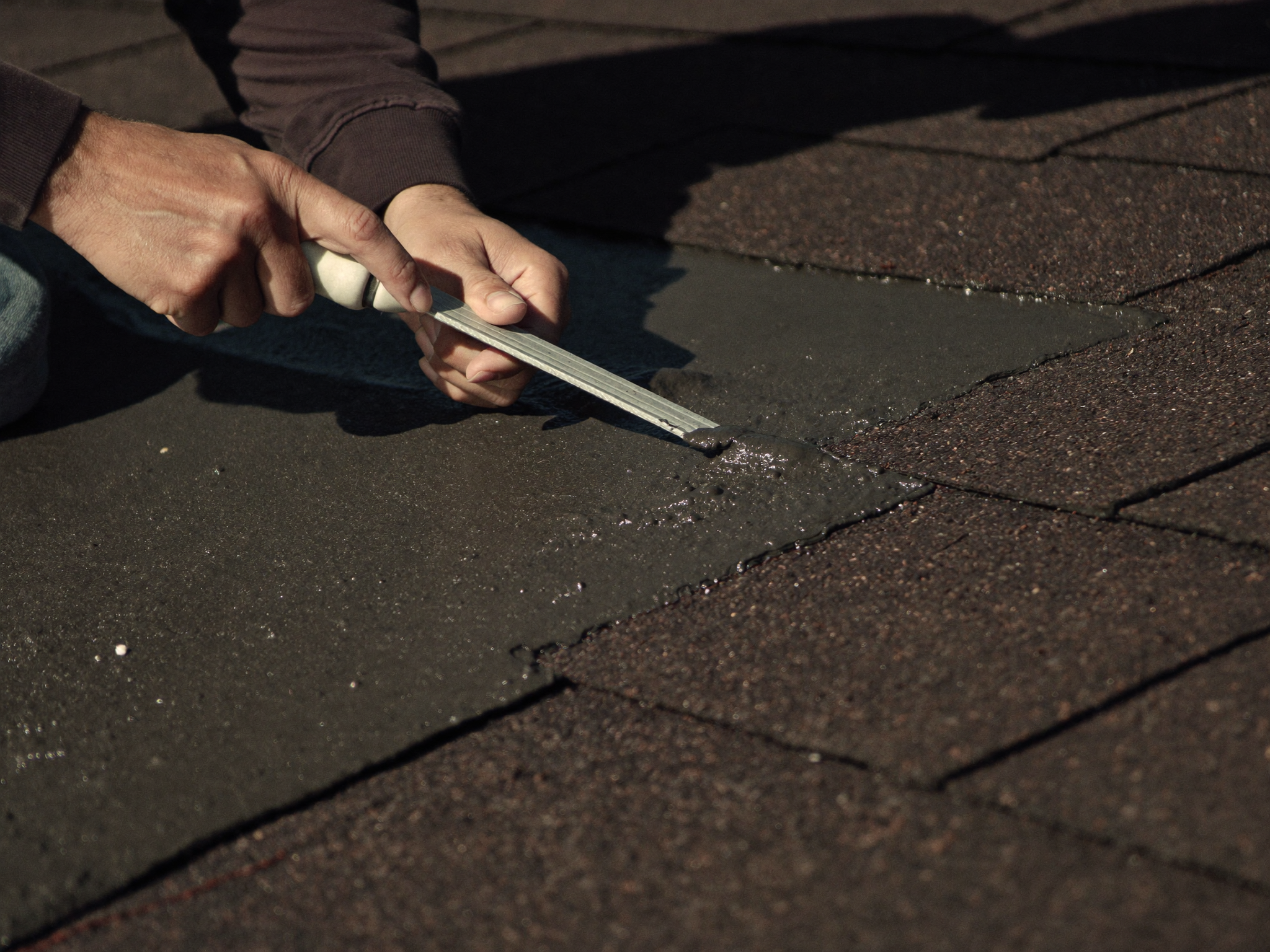 Close-up of roofer at work in Clevedon